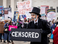 A person dressed as President Abraham Lincoln attends pro-choice and anti-abortion demonstrations at the Supreme Court as it hears oral argu...