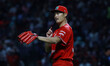 Tomohiro Anraku #77 of Diablos Rojos del Mexico is pitching against the New York Yankees d...