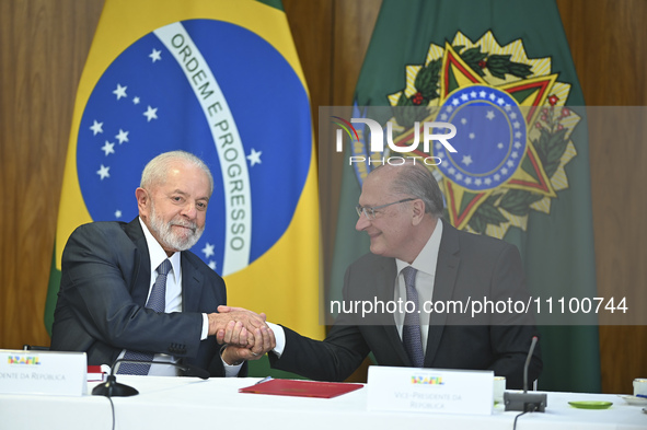 Brazil's President Luiz Inacio Lula da Silva, along with Vice President Geraldo Alckmin, is participating in a ceremony at the Planalto Pala...