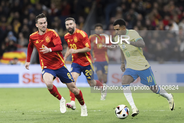 Rodrygo Goes of Brazil is in action during the friendly match between Spain and Brazil at Santiago Bernabeu Stadium in Madrid, Spain, on Mar...