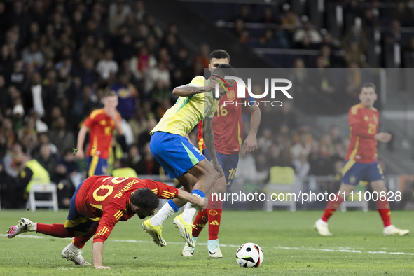 Daniel Carvajal of Spain and Wenderson Galeno of Brazil are fighting for the ball during the friendly match between Spain and Brazil at Sant...