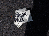 A sticker lays on the ground during abortion rights demonstrations outside of the Supreme Court in Washington, D.C. on March 26, 2024 as the...