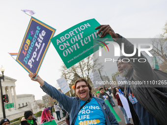 Abortion rights demonstrators face off with counterprotestors outside of the Supreme Court in Washington, D.C. on March 26, 2024 as the high...