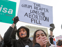 Anti-abortion rights demonstrators protest outside of the Supreme Court in Washington, D.C. on March 26, 2024 as the high court hears argume...