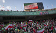 Iranian worshippers and supporters of Iran's Supreme Leader Ayatollah Ali Khamenei are wav...