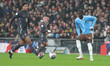 Jude Bellingham of England and Amadou Onana of Belgium are in action during the Internatio...