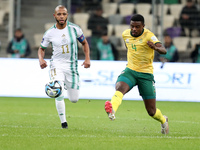 Yacine Brahimi of Algeria is in action with Teboho Mokoena of South Africa during the international friendly match in Algiers, Algeria, on M...