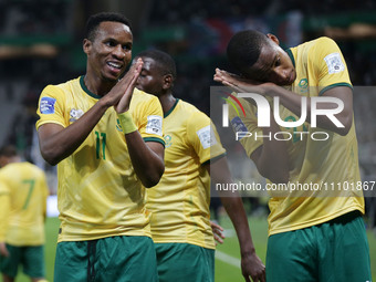 South African players are celebrating after scoring during the international friendly football match between Algeria and South Africa in Alg...
