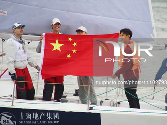 Wang Shenchao, a player for Shanghai Port Football Club, is participating as the ''captain'' of the J80 Sailing boat during the 2024 Shangha...