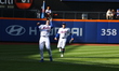 New York Mets third baseman Brett Baty #22 is making the grab during the eighth inning of...