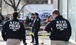 Crime scene investigators are at the shooting scene in the Bronx, New York, on Saturday af...