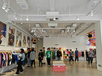 Customers are shopping at the first store of the US street brand Supreme in Shanghai, China, on April 1, 2024. (