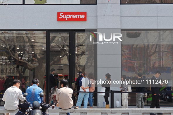 Customers are shopping at the first store of the US street brand Supreme in Shanghai, China, on April 1, 2024. 