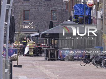 The hostage situation at the Petticoat cafe in Ede, Gelderland, Netherlands, is ending peacefully with the arrest of a suspect. A 28-year-ol...