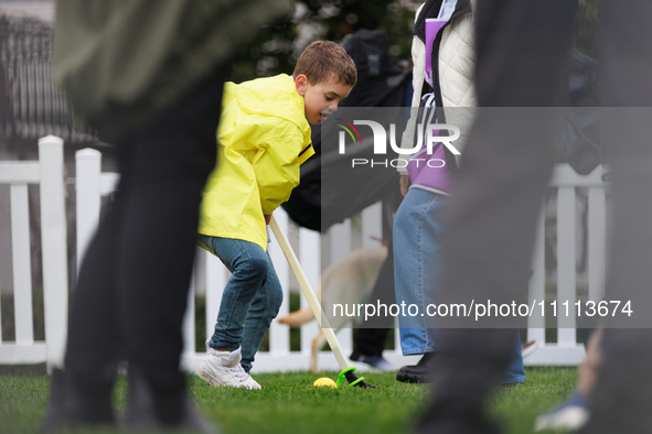 A child participates in the 2024 White House Easter Egg Roll on the South Lawn of the White House in Washington, D.C. on April 1, 2024. 