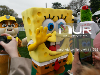 A person in a Spongebob Squarepants costume greets people at the 2024 White House Easter Egg Roll on the South Lawn of the White House in Wa...