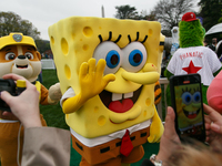 A person in a Spongebob Squarepants costume greets people at the 2024 White House Easter Egg Roll on the South Lawn of the White House in Wa...