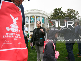 People attend the 2024 White House Easter Egg Roll on the South Lawn of the White House in Washington, D.C. on April 1, 2024. (