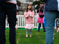 A child participates in the 2024 White House Easter Egg Roll on the South Lawn of the White House in Washington, D.C. on April 1, 2024. (