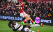 Morgan Gibbs-White of Nottingham Forest is battling with Calvin Bassey of Fulham during th...
