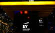 The Ernst & Young Global Limited (EY) logo is being displayed at their pavilion during the...