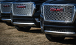 SHERWOOD PARK, CANADA - APRIL 3:GMC trucks parked outside a GMC dealership, on April 3, 2...