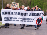 Dozens of climate activists from the Last Generation group are protesting over a police house search for one of their activists in Cologne,...