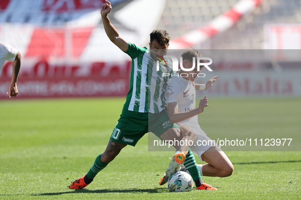 Jose Ulisses Arias (L) of Floriana is competing for the ball with Jake Azzopardi (R) of Valletta during the Malta BOV Premier League soccer...