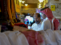 Shoppers are browsing the stalls at the Souq Waqif Traditional Market in preparation for the upcoming Eid al-Fitr, which signifies the concl...