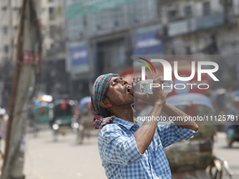 A rickshaw puller is drinking water to find relief from a heatwave in Dhaka, Bangladesh, on April 6, 2024. The Met Office reports that Bangl...