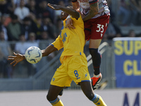 Riccardo Calafiori of Bologna and Lzlic Karlo of Frosinone are jumping for the ball during the Serie A soccer match between SSC Frosinone Ca...