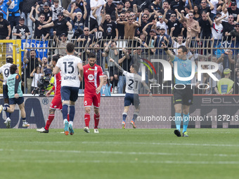 Matteo Politano is celebrating after scoring a goal during the Serie A football match between AC Monza and SSC Napoli at U-Power Stadium in...