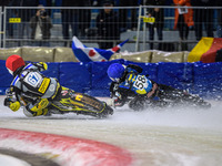 Heikki Huusko of Finland, wearing red and numbered 67, is passing Stefan Svensson of Sweden, in blue with the number 58, during the FIM Ice...