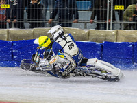 Sweden's Jimmy Olsen, wearing number 81 in yellow, is passing Finland's Max Koivula, number 24 in white, during the FIM Ice Speedway Gladiat...