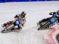 Austria's Franz Zorn, wearing white with the number 100, is leading Sweden's Jimmy Hornell Lidfalk, in red with the number 237, during the F...