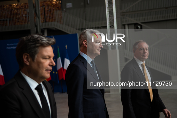 French Economy Minister Bruno Le Marie (center), Enterprise and Made in Italy Minister Adolfo Urso (right), and German Economy Minister and...