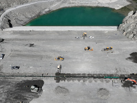 Construction is underway at the Kurchu Reservoir site in Korla, China, on April 9, 2024. (