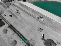 Construction is underway at the Kurchu Reservoir site in Korla, China, on April 9, 2024. (