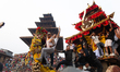 Nepalese people are pulling the chariot of Deity Bhairab during the celebrations of the tr...