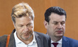 German Minister for Economic Affairs and Climate Action Robert Habeck (L) and German Minis...