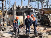 Utility workers are repairing an energy facility damaged by Russian shelling in Kharkiv, northeastern Ukraine, on April 10, 2024. NO USE RUS...
