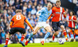 Erling Haaland, wearing the number 9 jersey for Manchester City, is in action during the P...