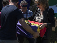 Relatives are receiving the remains of Vicente Martin Garcia, who died in the Franco prison of Valdenoceda in 1941, wrapped in the republica...