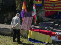 A man is observing the tribute plaque with the names of all those who died in the Valdenoceda prison for their loyalty to the Republic, at t...