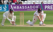 Harry Finch of Kent CCC and Essex's Matt Critchley are in action during day two of the Vit...