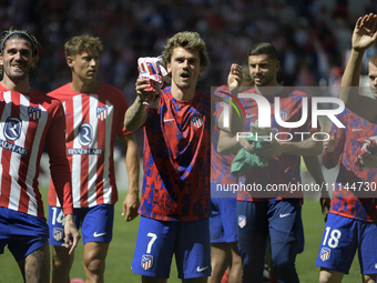 Atletico de Madrid players are celebrating their victory in the LaLiga EA Sports match against Girona FC at Civitas Metropolitano Stadium in...