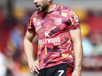 Neal Maupay is playing for Brentford in the Premier League match against Sheffield United at the Gtech Community Stadium in Brentford, on Ap...