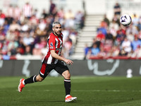 Neal Maupay of Brentford is on the ball during the Premier League match between Brentford and Sheffield United at the Gtech Community Stadiu...