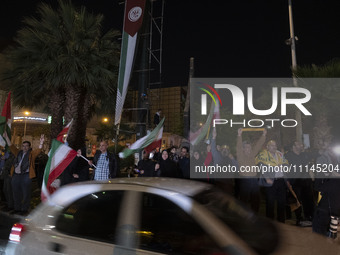 Iranians are participating in celebrations of Iran's IRGC UAV and missile attack against Israel in downtown Tehran, Iran, on April 14, 2024....