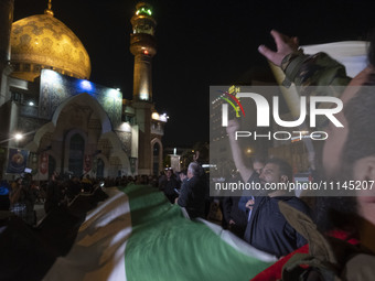 Iranians are shouting anti-U.S. and anti-Israeli slogans while celebrating Iran's IRGC UAV and missile attack against Israel in downtown Teh...